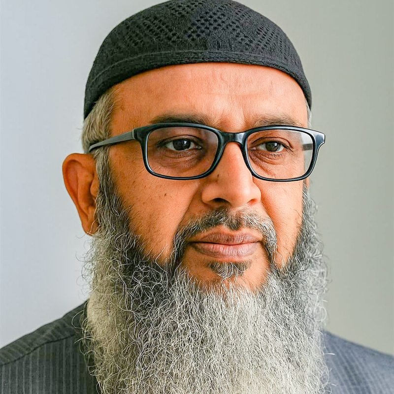 Portrait of Malik Bader Saeed, CEO of Al Qasim Institute